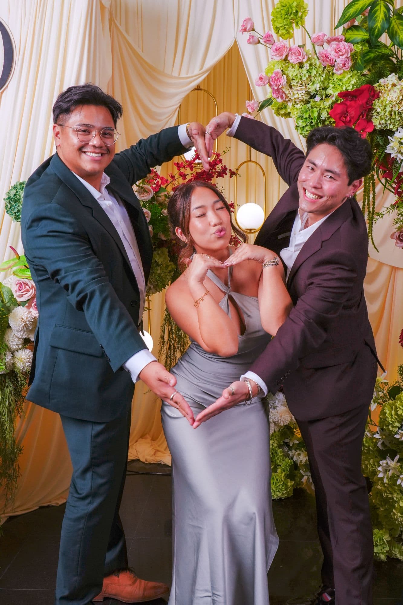 Wedding guests posing together at an Inland Empire portrait station